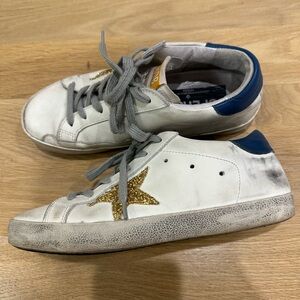 White Sneakers with Gold Star Accent